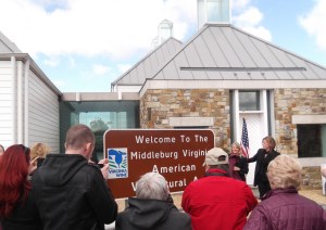 Boxwood's Rachel Martin and VA First Lady Maureen McDonnell unveil the new Middleburg AVA sign.